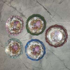 Set of five Limoges mini plates
